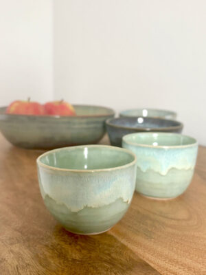 Small turquoise blue pots made by Deb McPeake