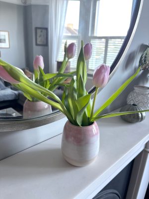 Beautiful handmade vase with tulips